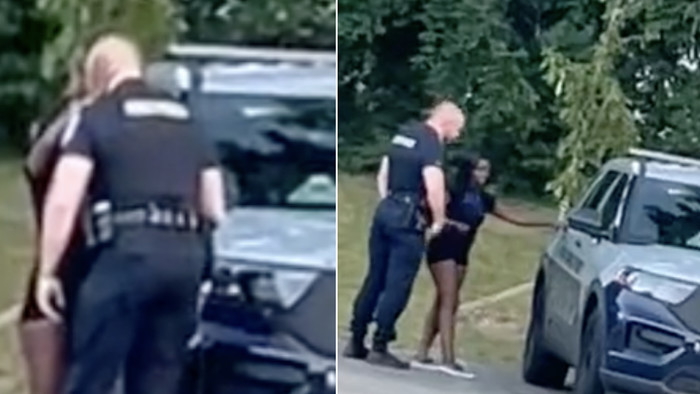 Police Launch Investigation Into Viral Video Of Cop Kissing Woman And Joining Her In Backseat Of